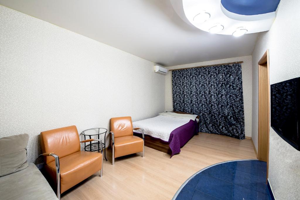 Cama o camas de una habitación en Domumetro na Vernadskogo