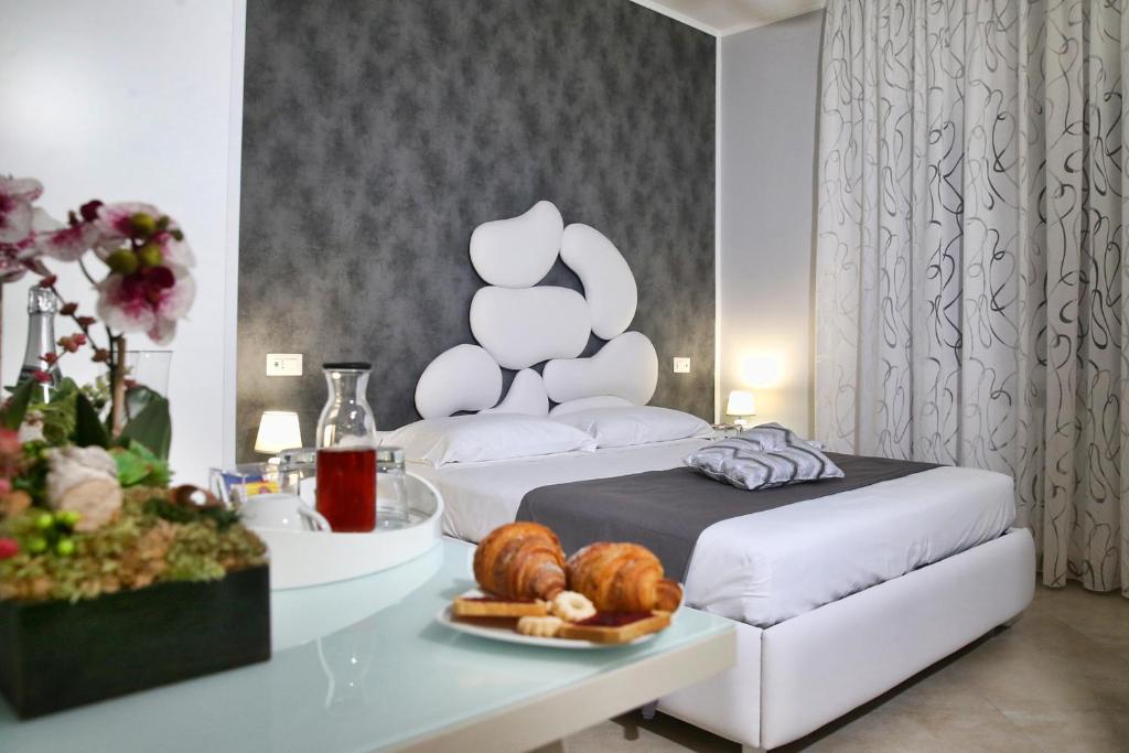 Posteľ alebo postele v izbe v ubytovaní B&B Pompei Olympus