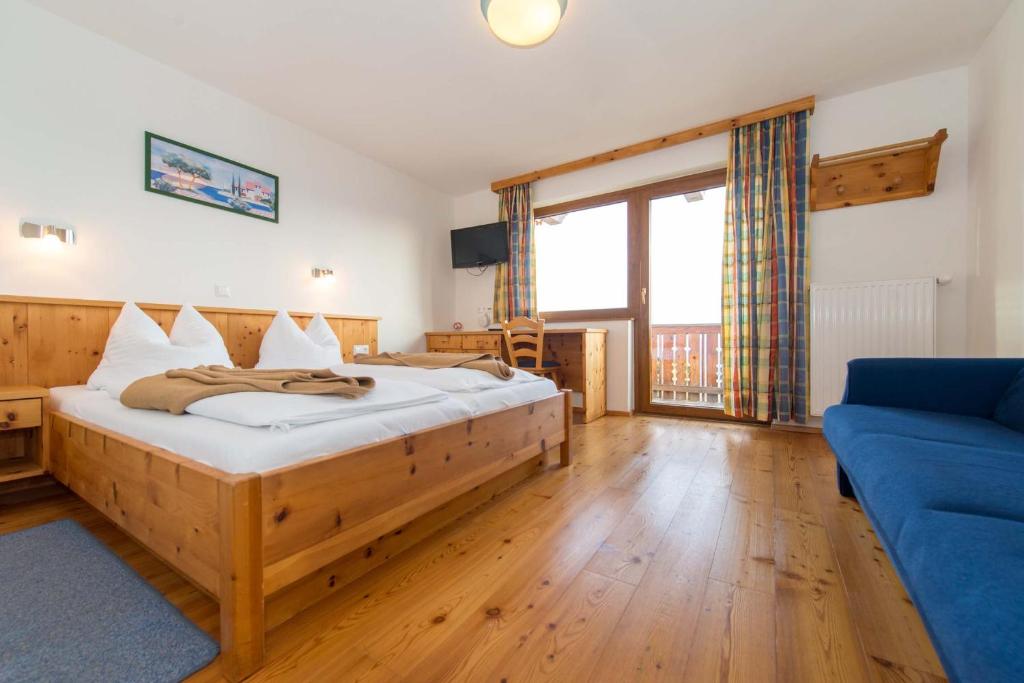 Postel nebo postele na pokoji v ubytování Almhotel Fichtenheim
