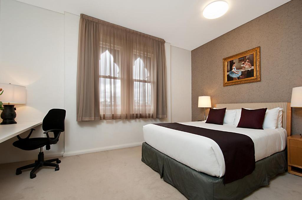 Postel nebo postele na pokoji v ubytování Adabco Boutique Hotel Adelaide