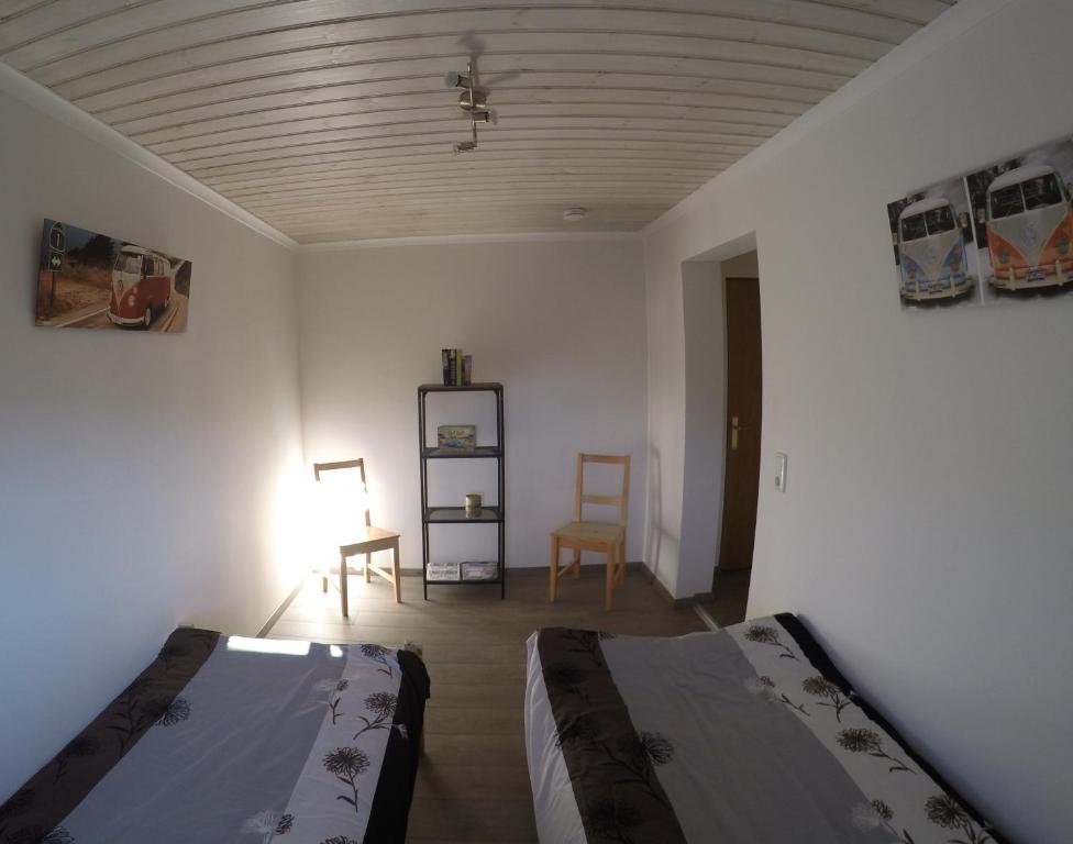 Postel nebo postele na pokoji v ubytování Haus Pistenblick