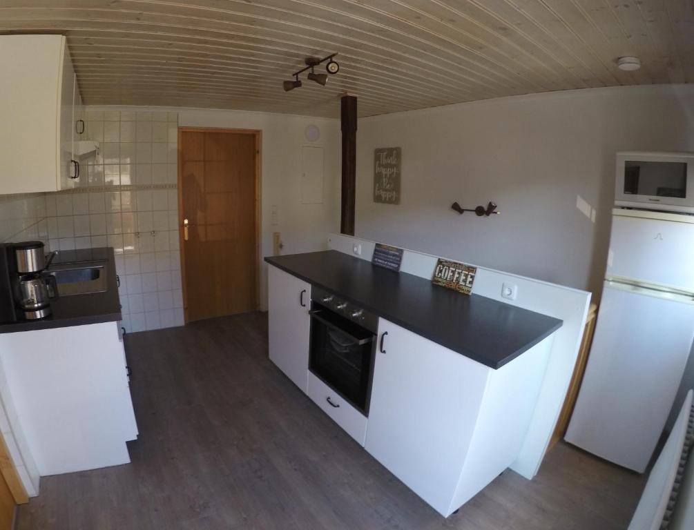 Kuchyň nebo kuchyňský kout v ubytování Haus Pistenblick