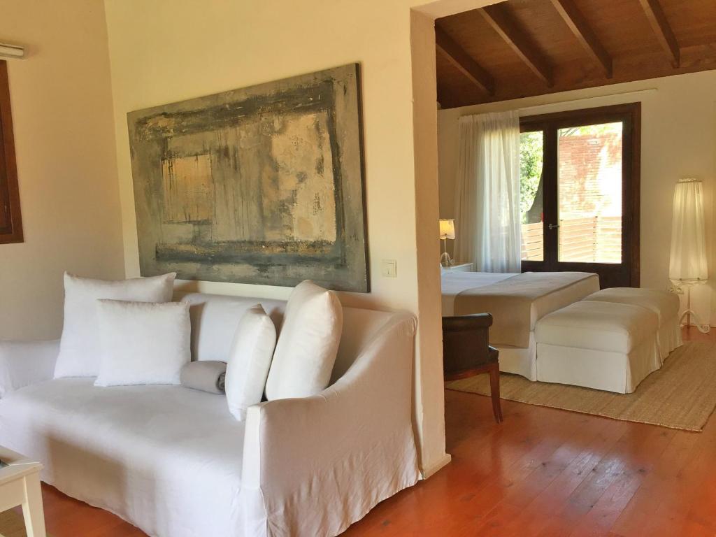 Posteľ alebo postele v izbe v ubytovaní Hotel Masia La Palma