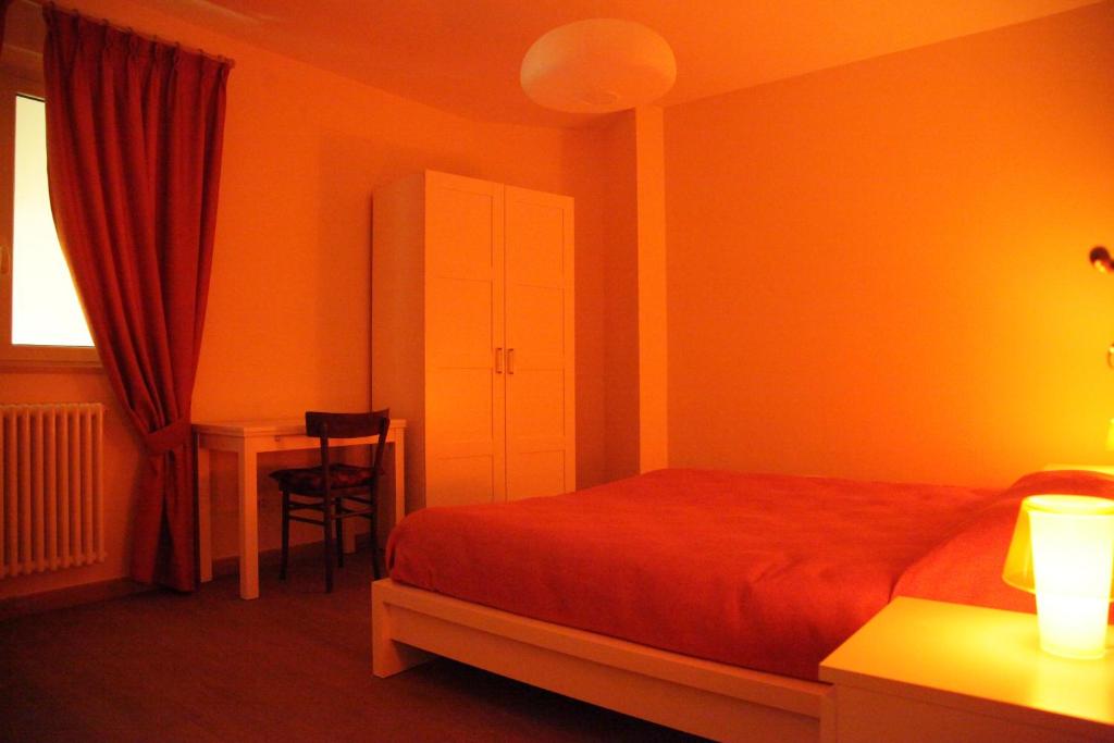 Postel nebo postele na pokoji v ubytování Casa Natalì