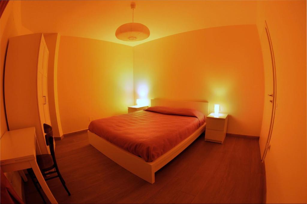 Postel nebo postele na pokoji v ubytování Casa Natalì