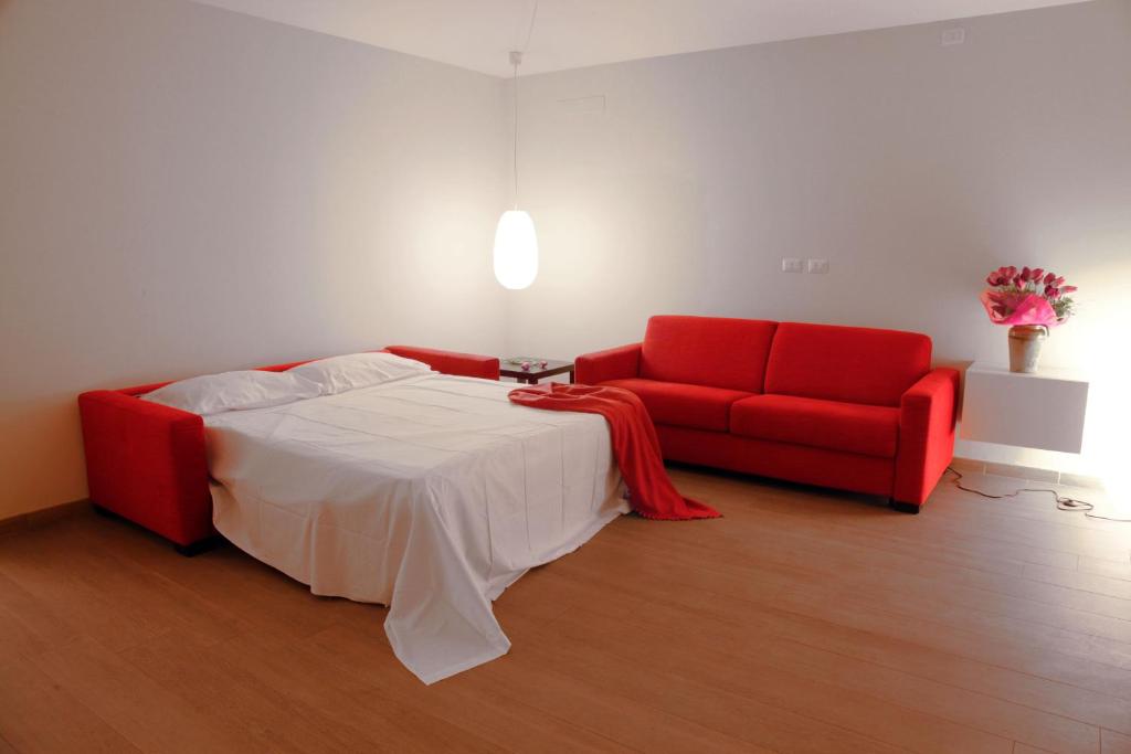 Postel nebo postele na pokoji v ubytování Casa Natalì