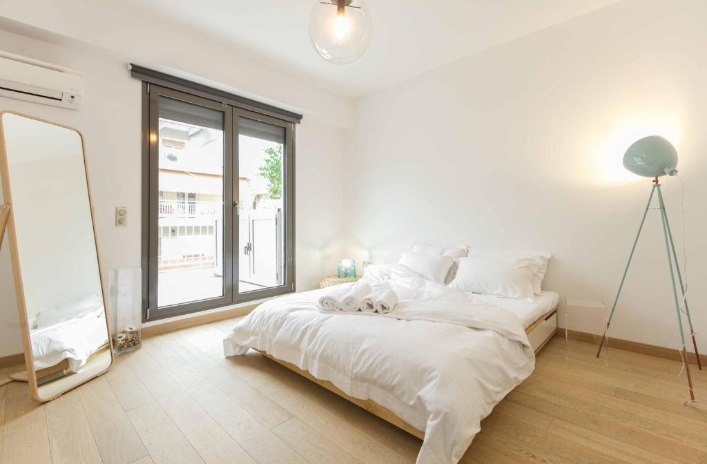 Postel nebo postele na pokoji v ubytování Stylish 3-Bedroom Apartment & Terrace