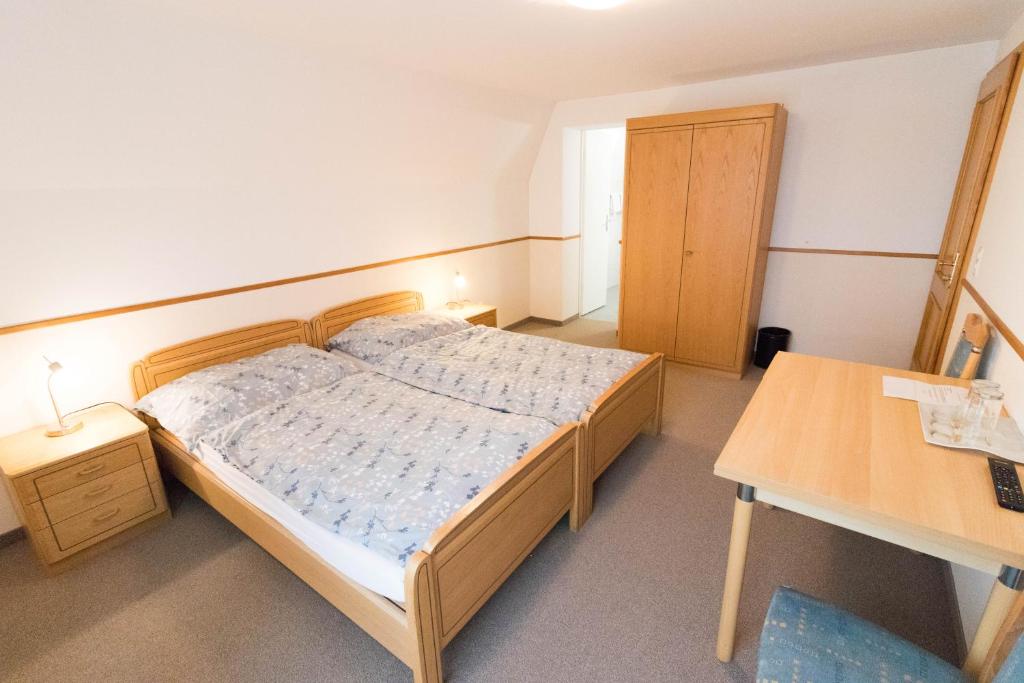 Letto o letti in una camera di Gasthaus Ochsen