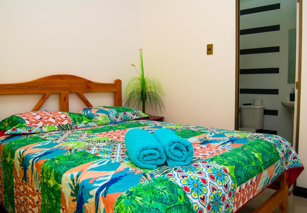 Postel nebo postele na pokoji v ubytování Hostal Lecher