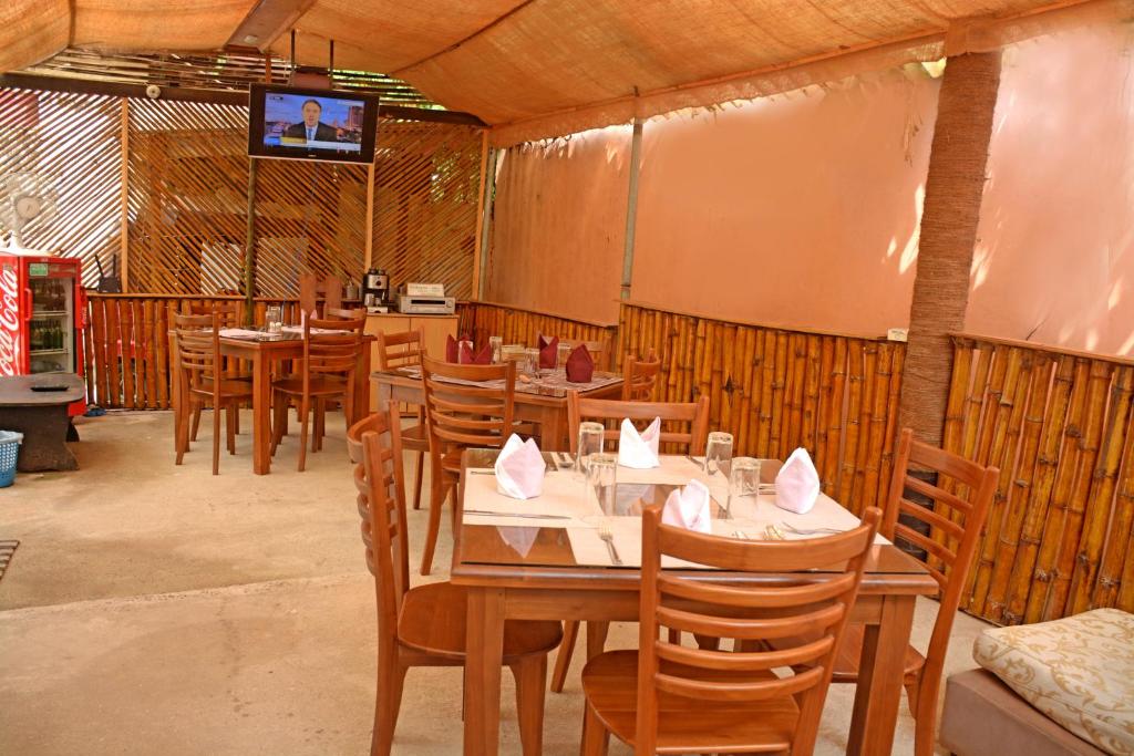 TV a/nebo společenská místnost v ubytování Hotel Thilon