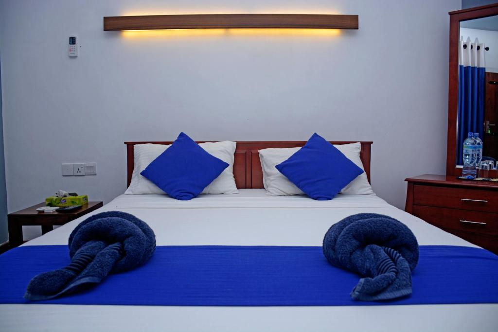 Postel nebo postele na pokoji v ubytování Hotel Thilon