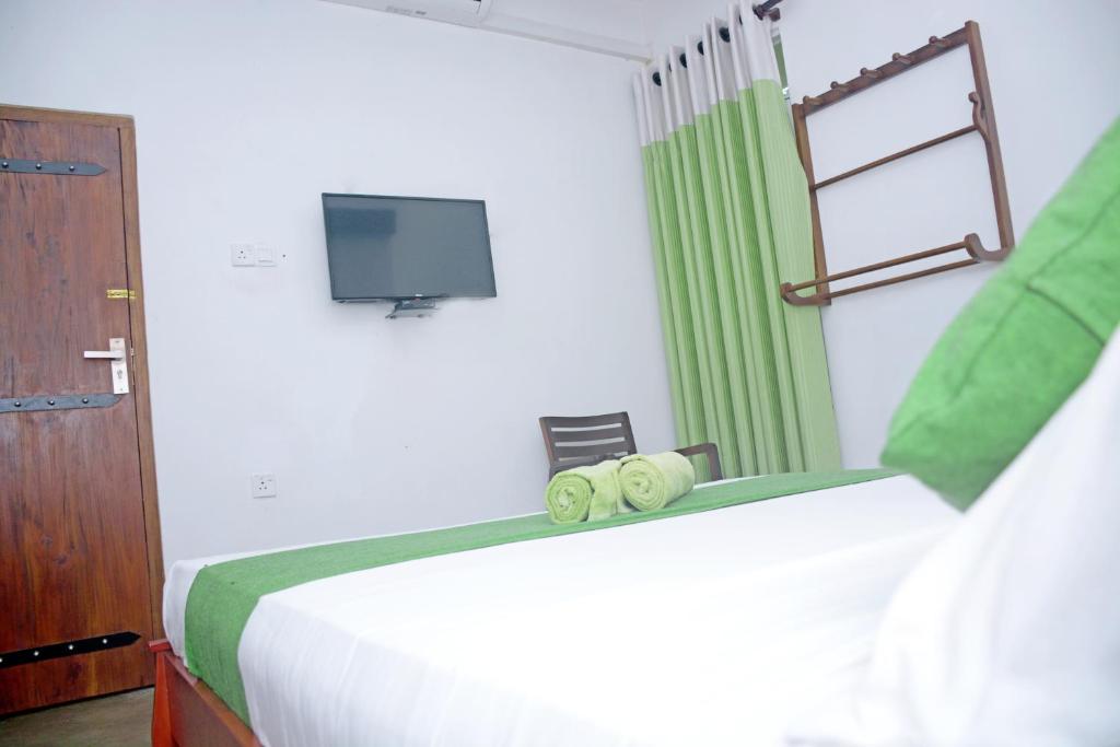 TV a/nebo společenská místnost v ubytování Hotel Thilon