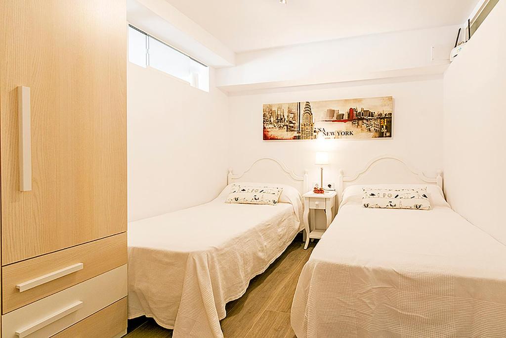 Postel nebo postele na pokoji v ubytování Apartment CB 2