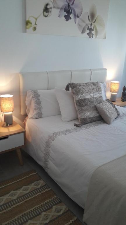 Postel nebo postele na pokoji v ubytování Apartamento Bristol Beach