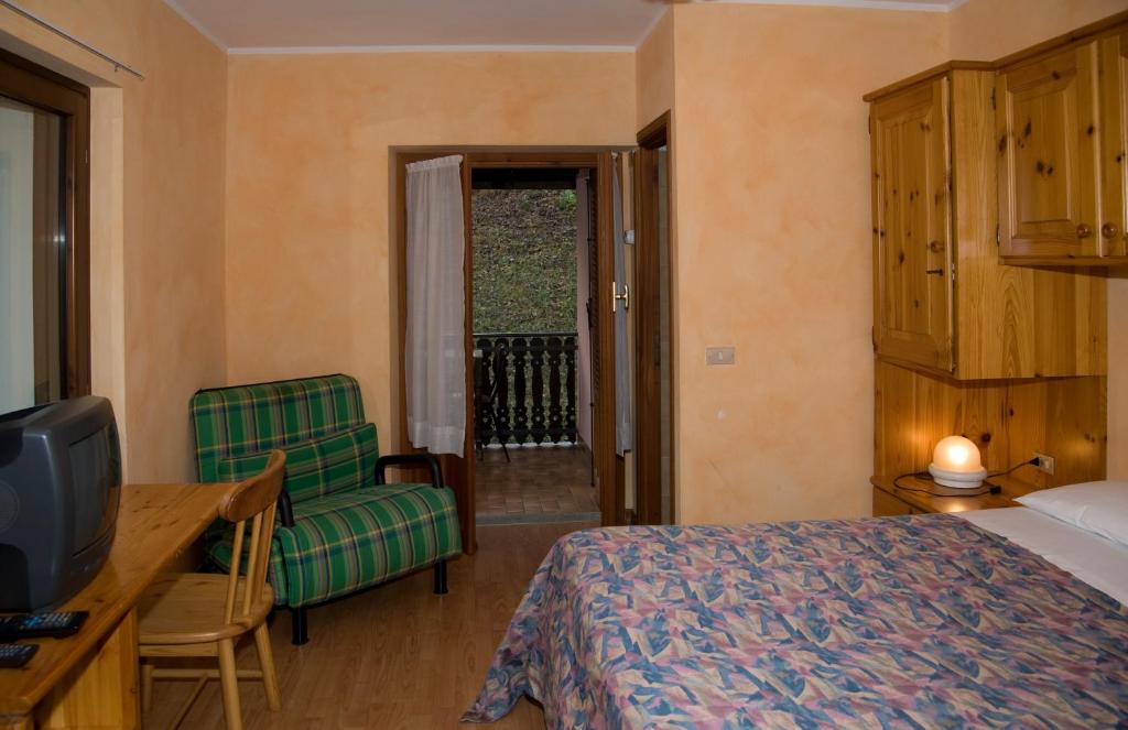 Letto o letti in una camera di Albergo Dei Pescatori