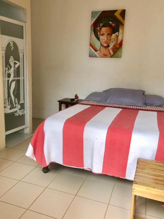 Postel nebo postele na pokoji v ubytování Hotel Santorini