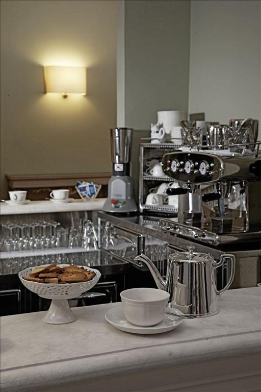 Příslušenství pro přípravu čaje a kávy v ubytování Hotel & Residenza 100 Torri