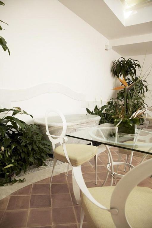 Posezení v ubytování Hotel & Residenza 100 Torri