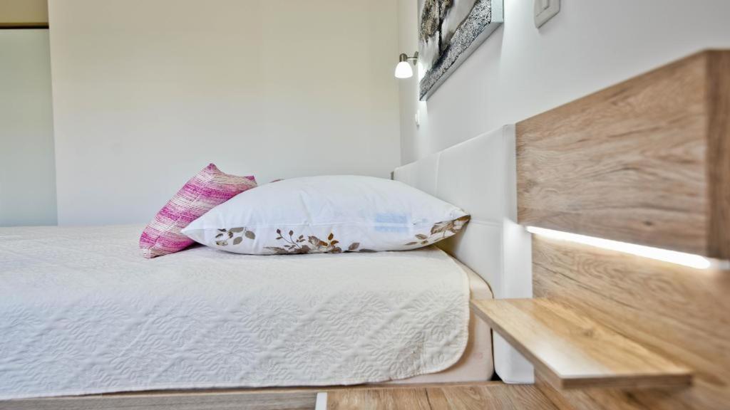Posteľ alebo postele v izbe v ubytovaní Villa Jela Zadar