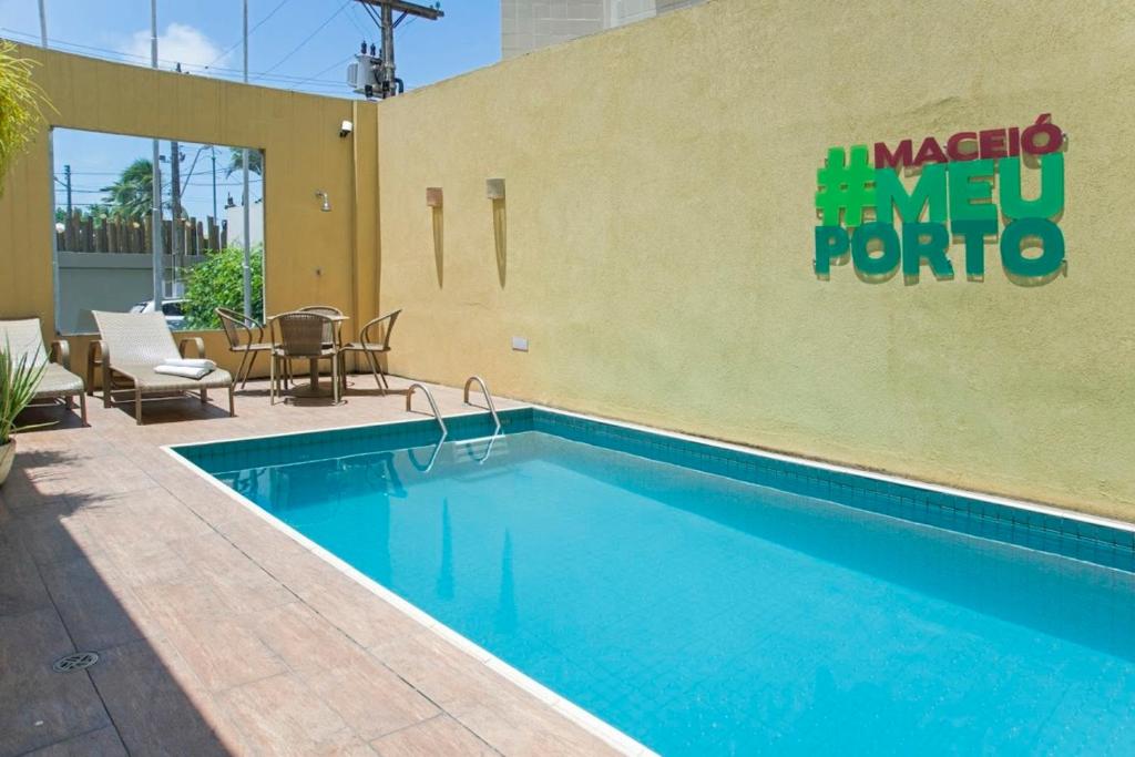 
The swimming pool at or near Hotel Porto Maceió
