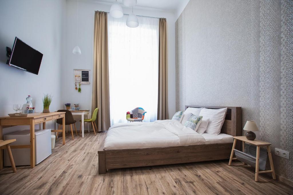 Postel nebo postele na pokoji v ubytování Budapest Passage 1