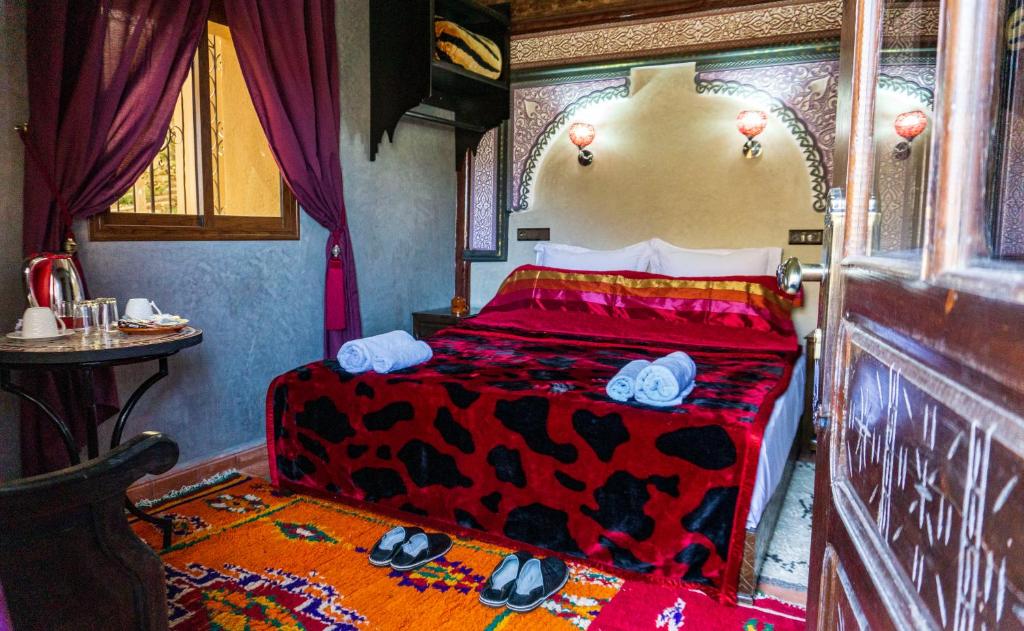 Postel nebo postele na pokoji v ubytování Riad Atlas Panorama