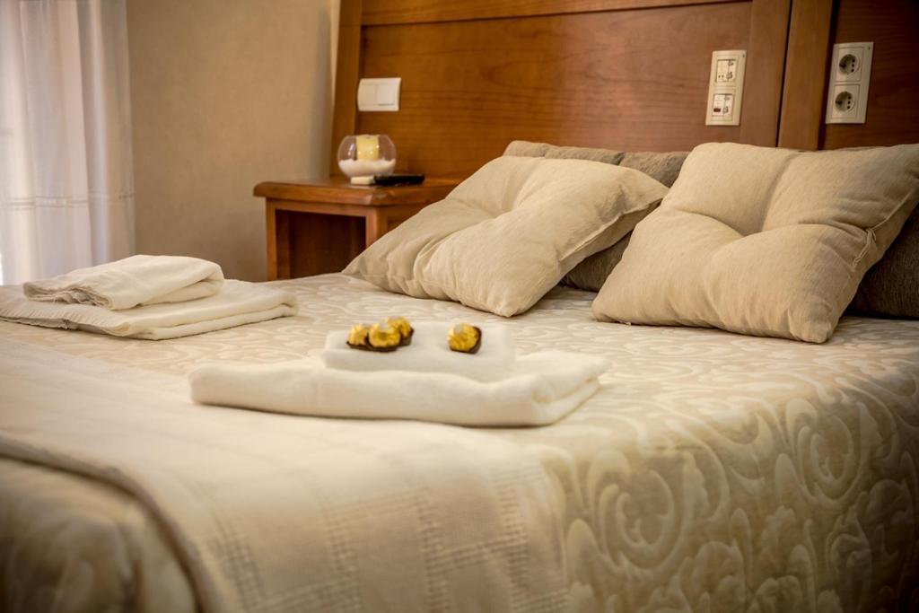 Postel nebo postele na pokoji v ubytování Hostal Tic-Tac