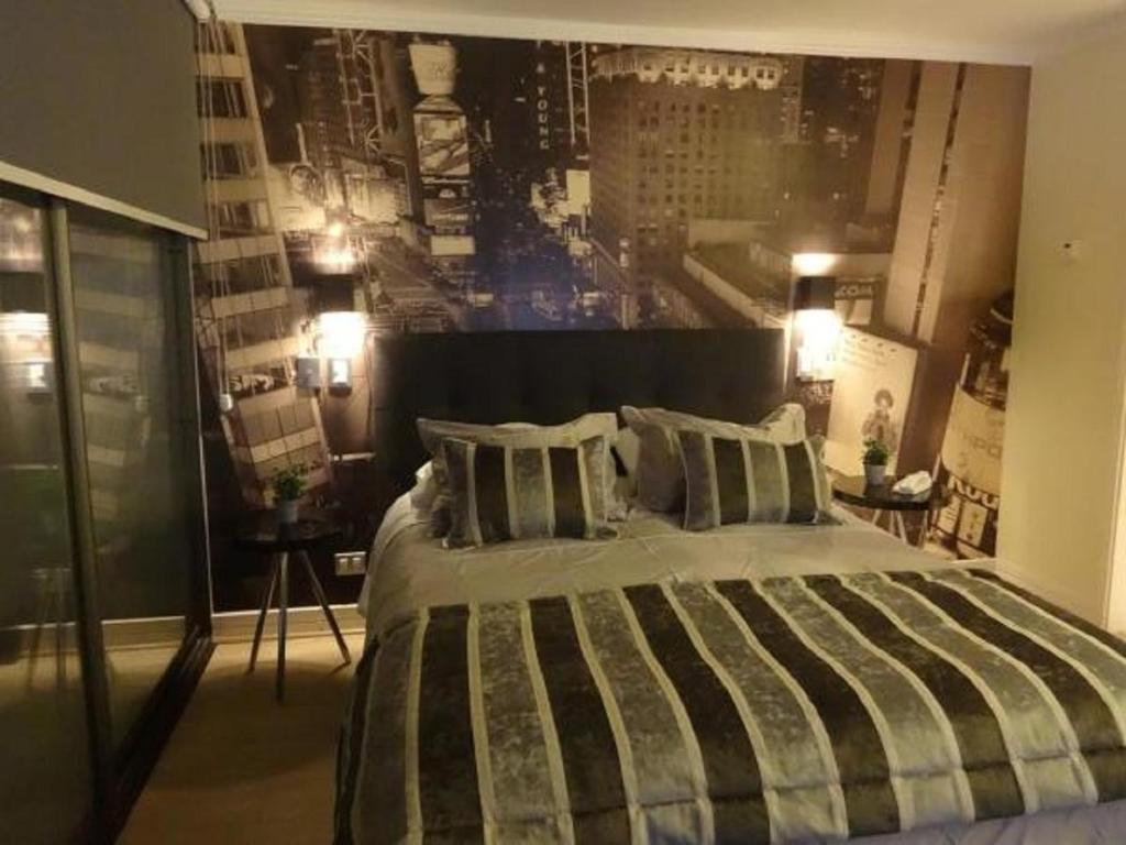 Tempat tidur dalam kamar di Apartamento Avenida Kennedy