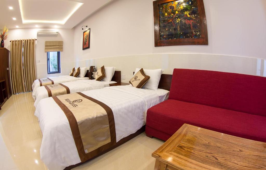Postel nebo postele na pokoji v ubytování Bean Grass Homestay