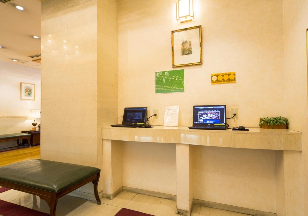 TV a/nebo společenská místnost v ubytování Hotel Claiton Esaka