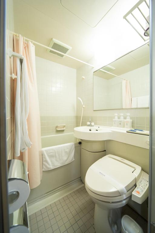 Koupelna v ubytování Hotel Claiton Esaka
