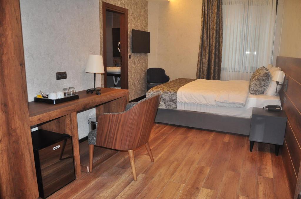 Postel nebo postele na pokoji v ubytování Life Point Hotel