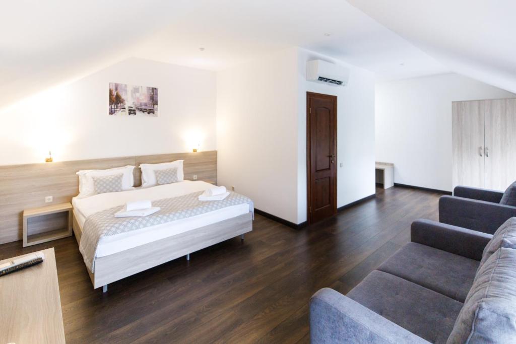 Postel nebo postele na pokoji v ubytování Hotel Antonio