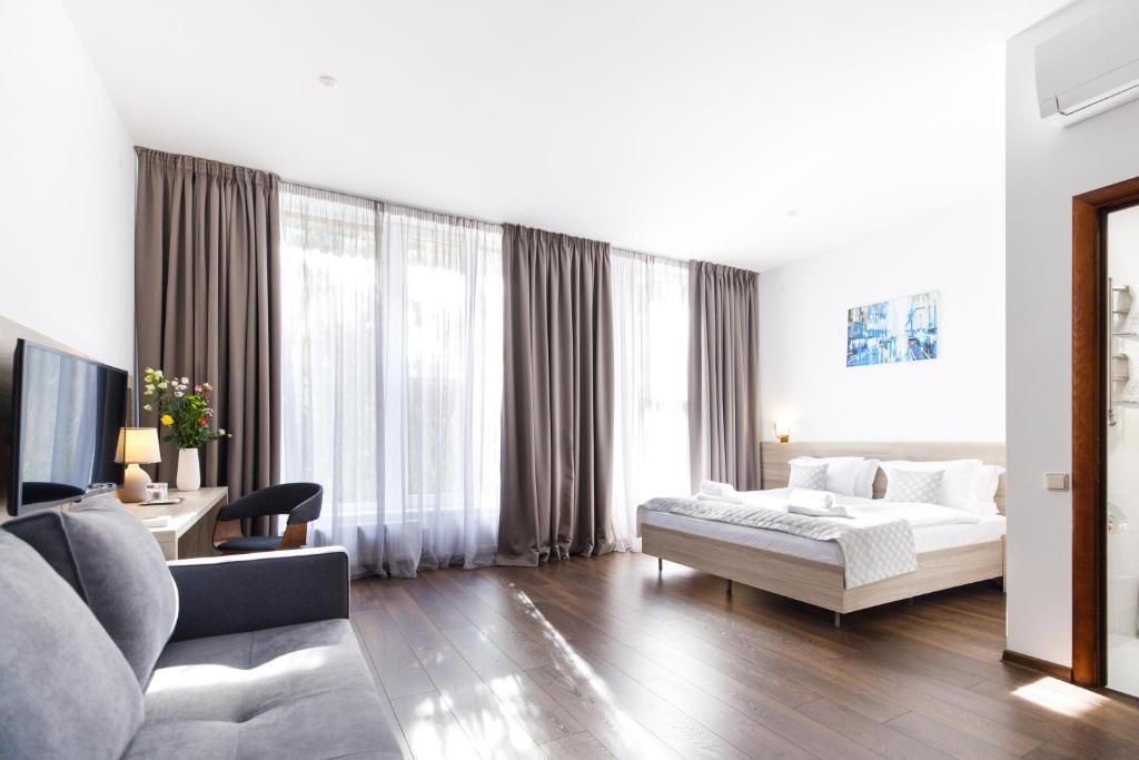 Postel nebo postele na pokoji v ubytování Hotel Antonio
