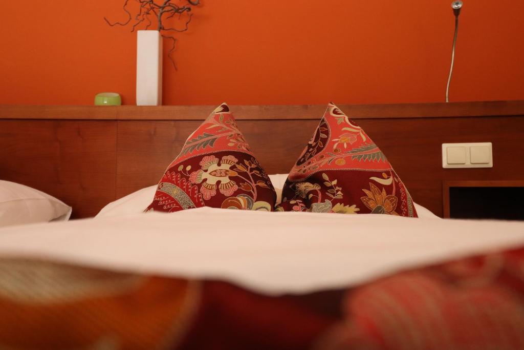 Tempat tidur dalam kamar di Hotel &Ouml;hlknechthof
