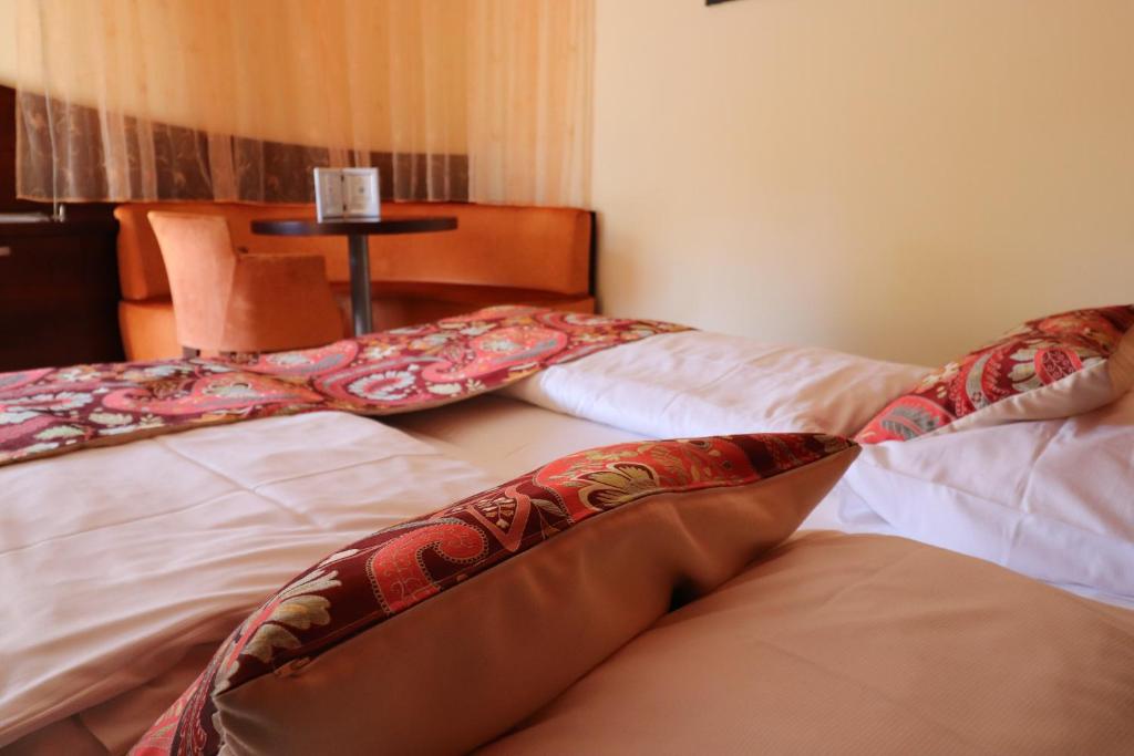Postel nebo postele na pokoji v ubytování Hotel Öhlknechthof