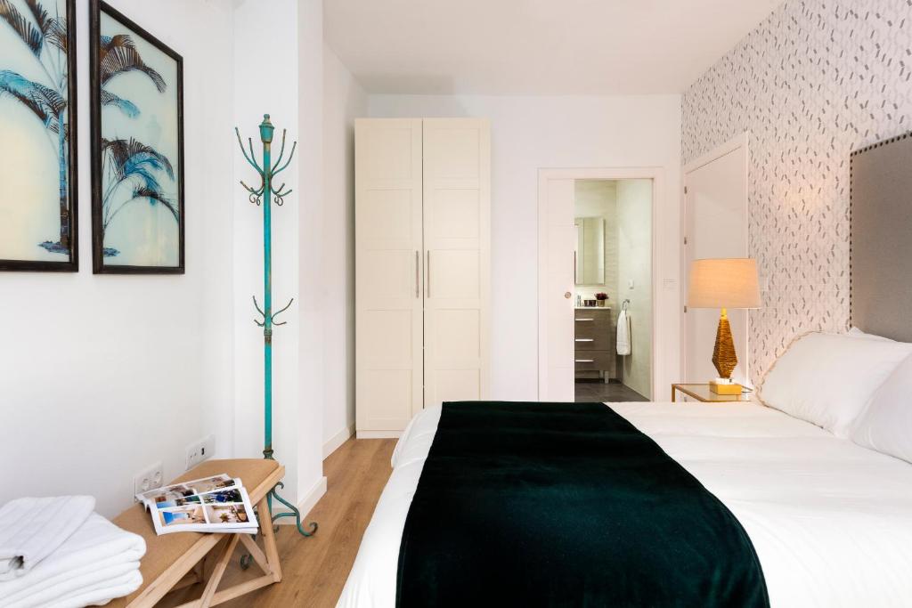Posteľ alebo postele v izbe v ubytovaní Genteel Home Baños