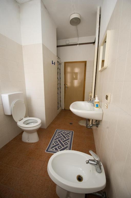 Koupelna v ubytování Ostello Domus Civica