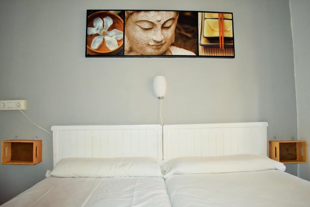 Cama o camas de una habitación en Pension Castil