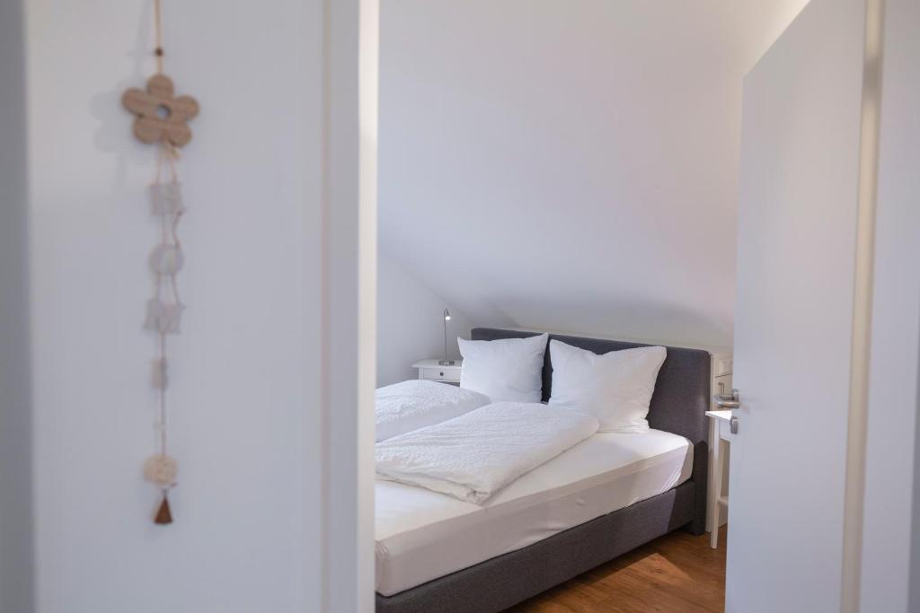Postel nebo postele na pokoji v ubytování Ferienwohnung Stern