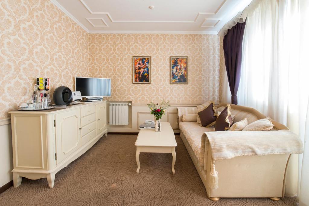 Kuchyň nebo kuchyňský kout v ubytování Oselya Hotel