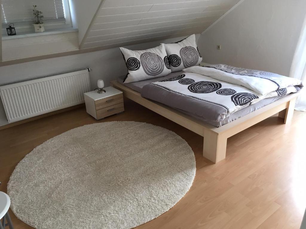 Säng eller sängar i ett rum på Zur Burgmauer