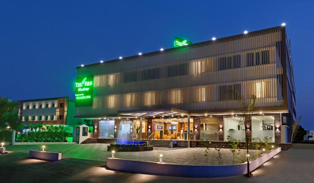 a building with a green sign on top of it at The Fern Residency, Bhuj in Bhuj