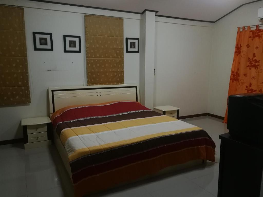 Postel nebo postele na pokoji v ubytování Poolvilla Armthong Home