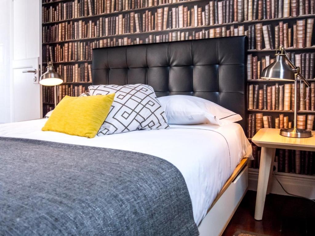 Postel nebo postele na pokoji v ubytování Procyon Boutique & Suites