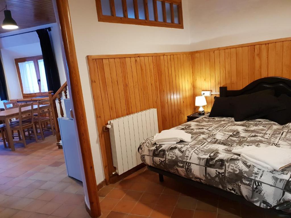 Postel nebo postele na pokoji v ubytování Apartaments Can Bundanci