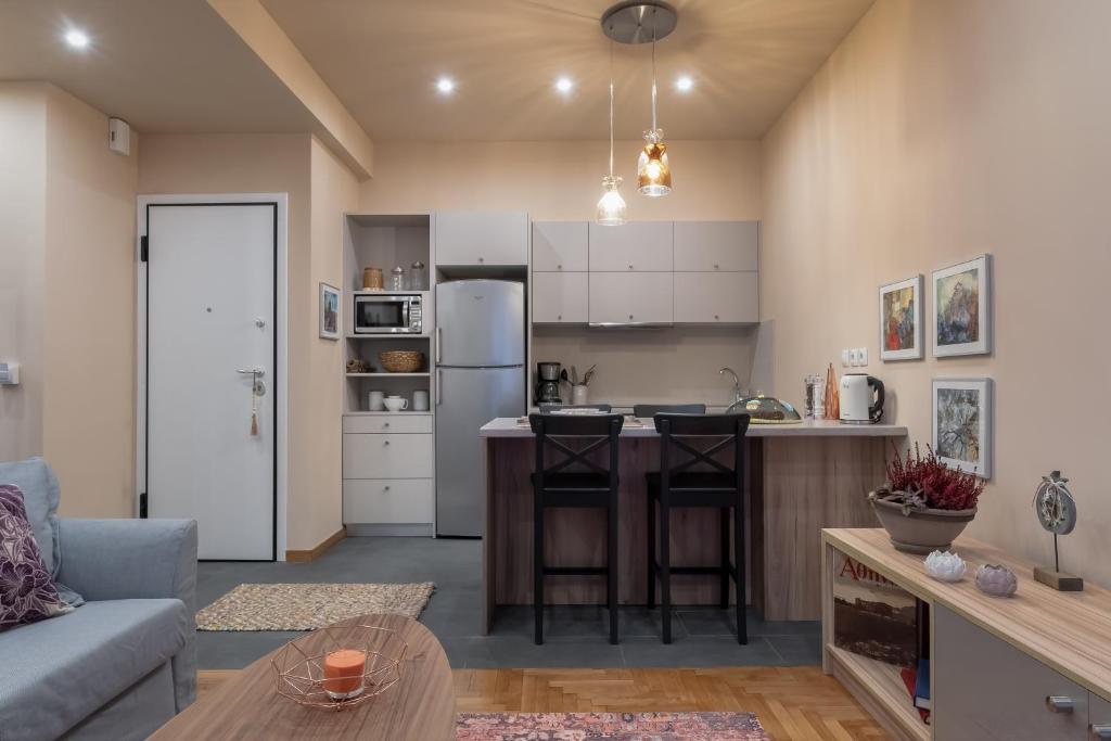 A kitchen or kitchenette at Absolute Athens v