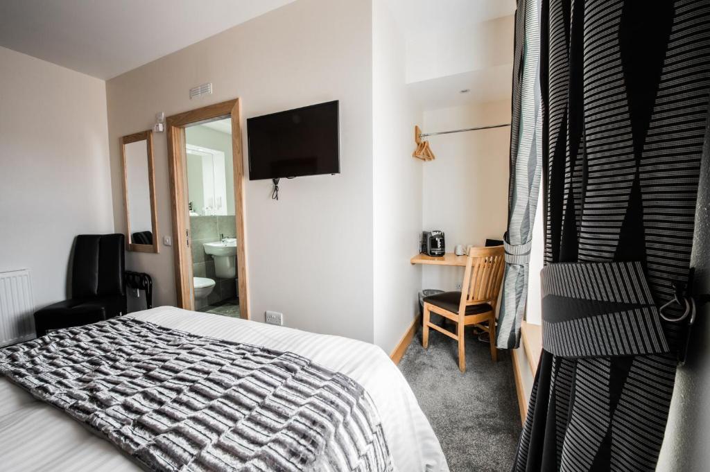 Postel nebo postele na pokoji v ubytování Seaview Hotel
