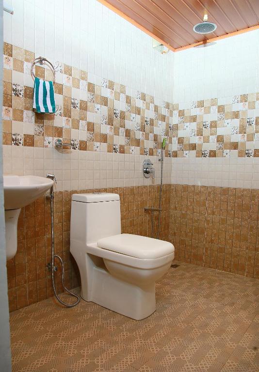 Koupelna v ubytování Marari Adonis Beach Villa