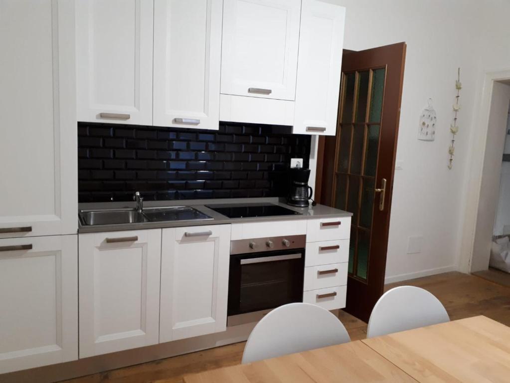 Kuchyňa alebo kuchynka v ubytovaní La casa di Cì-CÌ